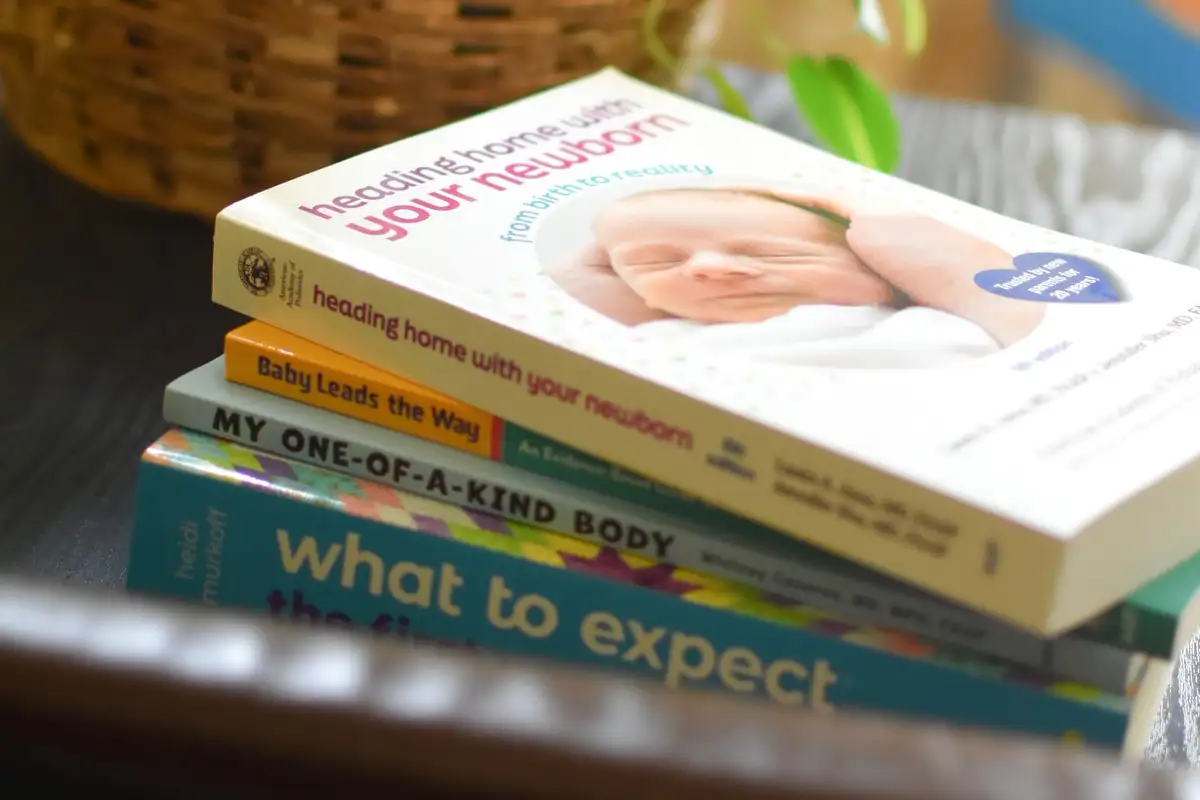 Books offered to expecting families at South Royalton Health Center, including Heading Home With Your Newborn and What to Expect.