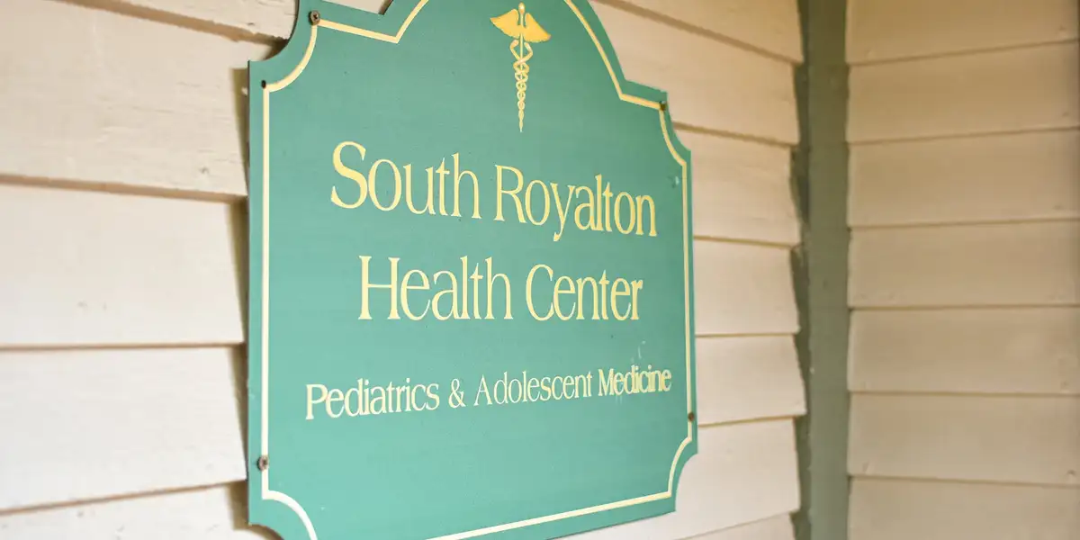 The South Royalton Health Center sign beside the entrance, reading Pediatrics and Adolescent Medicine.